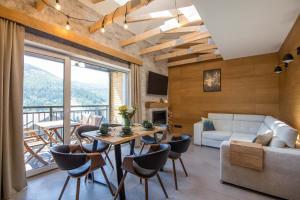 Posedenie v ubytovaní Apartament Słoneczna Góra 1 z biokominkiem - Dream Apart