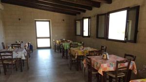 A restaurant or other place to eat at Masseria Cricelli