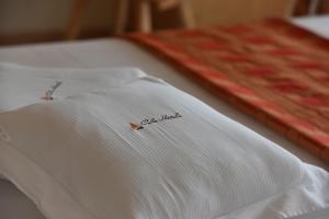 Postel nebo postele na pokoji v ubytování Hotel Cristallo