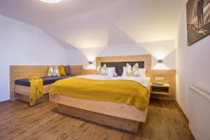 Katil atau katil-katil dalam bilik di Bauernhof im Zillertal, der Badererhof