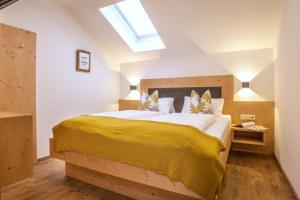 Letto o letti in una camera di Badererhof Christine Wechselberger