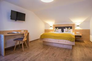 Letto o letti in una camera di Badererhof Christine Wechselberger