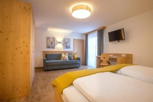 Letto o letti in una camera di Badererhof Christine Wechselberger