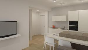 Kuchyň nebo kuchyňský kout v ubytování Hotel & Aparthotel Carinthia S