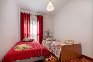 Katil atau katil-katil dalam bilik di Senna Apartment