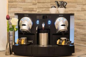 Facilități de preparat ceai și cafea la Town House 62
