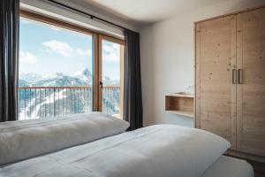 A bed or beds in a room at Sartu Apartments