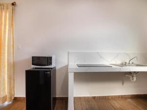 Dapur atau dapur kecil di José y Glendy Hotel