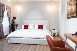 Postel nebo postele na pokoji v ubytování Adamas House Hotel Boutique