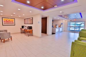 a lobby of a hospital with chairs and a table at Holiday Inn Express Hotel & Suites Dickson, an IHG Hotel in Dickson