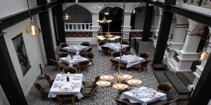 an overhead view of a restaurant with tables and chairs at Mansion Azul Cholula in Cholula