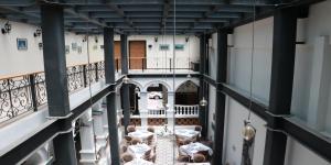 an overhead view of a room with tables and chairs at Mansion Azul Cholula in Cholula