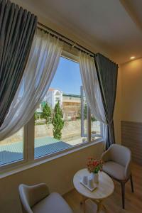 Posezení v ubytování Khanh Uyen 1 Hotel