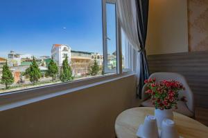 Balkón nebo terasa v ubytování Khanh Uyen 1 Hotel