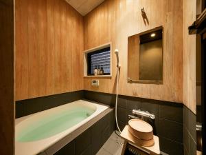 Kylpyhuone majoituspaikassa Kikyo-an