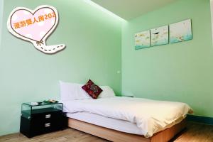 Ένα ή περισσότερα κρεβάτια σε δωμάτιο στο I-Sea B&B