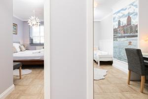 Posteľ alebo postele v izbe v ubytovaní Apartments 350m to the Beach Gdańsk Piastowska by Renters Prestige