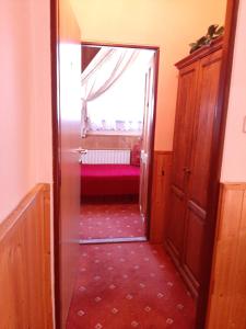 Ένα ή περισσότερα κρεβάτια σε δωμάτιο στο garni Hotel ASAS***