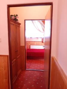 Ένα ή περισσότερα κρεβάτια σε δωμάτιο στο garni Hotel ASAS***
