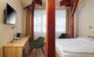 Sjónvarps- og/eða afþreyingartæki á Hotel Dymník