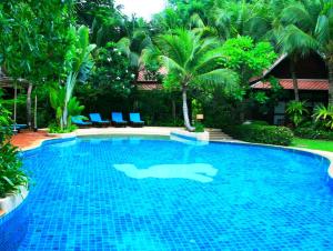 The swimming pool at or close to Rabbit Resort Pattaya-Sha Extra Plus