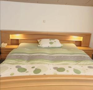 Postel nebo postele na pokoji v ubytování Landhotel Heidkrug