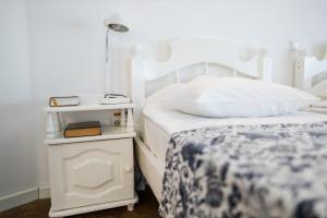 
Кровать или кровати в номере Старая Гостиница Лавры
