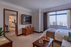 TV a/nebo společenská místnost v ubytování Changsha Sun Shine Hotel