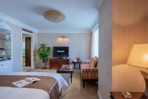 TV a/nebo společenská místnost v ubytování Changsha Sun Shine Hotel