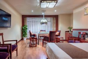 TV a/nebo společenská místnost v ubytování Changsha Sun Shine Hotel