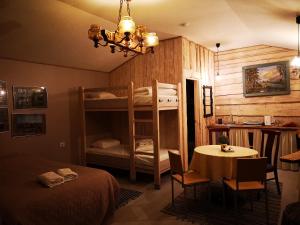 
A bunk bed or bunk beds in a room at Viesu nams Vecmuiža
