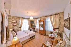 Postel nebo postele na pokoji v ubytování Cumbali Konak Hotel (Adults Only +12)