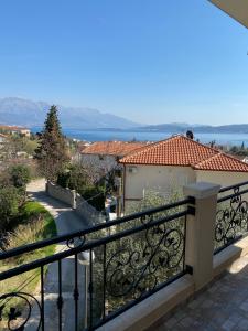 a view from the balcony of a house at Apartments Sneki in Baošići