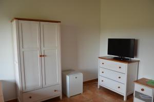Sjónvarps- og/eða afþreyingartæki á Hotel Na Statku Mirošov