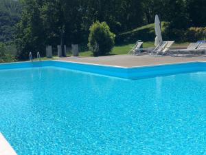 Bazén v ubytování Agriturismo Le Valli nebo v jeho okolí