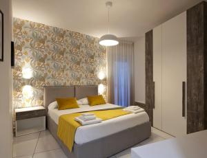 Postel nebo postele na pokoji v ubytování YourHome - Maison Nonna Anna
