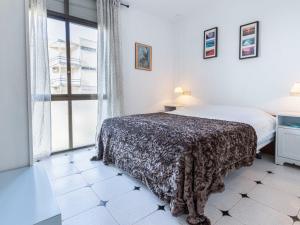 Llit o llits en una habitació de Apartment Horta del Mar by Interhome