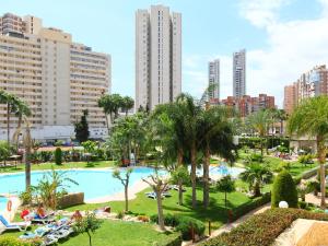 a view of a pool in a city with tall buildings at Apartment Los Gemelos-4 in Benidorm