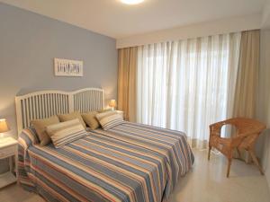 Postel nebo postele na pokoji v ubytování Apartment Tor Serena by Interhome