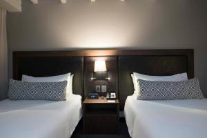 Ένα ή περισσότερα κρεβάτια σε δωμάτιο στο Movich Hotel Las Lomas