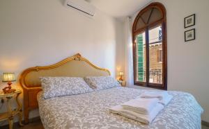 Cama ou camas em um quarto em Amorucci House