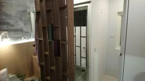 a bathroom with a shower with a glass door at Camping Le Ventadour in Meyras +105 photos