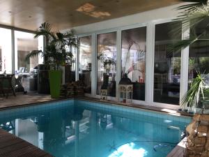 Bazén v ubytování Stadtvilla Intzeplatz - Apartment Norderney nebo v jeho okolí + 28 fotografií