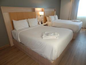 Letto o letti in una camera di Radisson Colon 2,000 Hotel & Casino