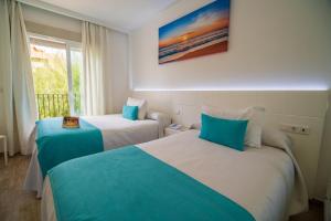 Cama o camas de una habitación en Hotel Romerito