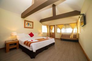 Кровать или кровати в номере El Sauce Resort - Hotel Asociado Casa Andina