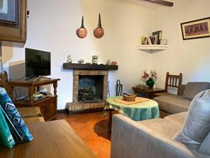 Posezení v ubytování Vivelorural Casa y piscina en Zahara de la Sierra