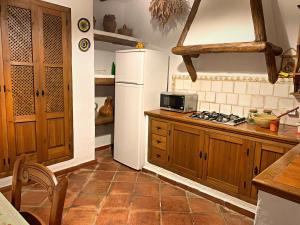 Kuchyňa alebo kuchynka v ubytovaní Vivelorural casa en pueblo de Zahara de la Sierra