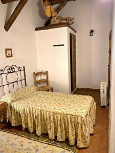 Posteľ alebo postele v izbe v ubytovaní Vivelorural casa en pueblo de Zahara de la Sierra