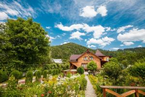 Fotografie z fotogalerie ubytování Хата Різьбяра v destinaci Beloberëzka